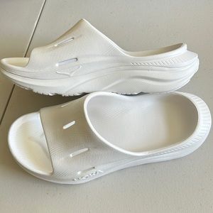 Hoka slides in white. New without tags